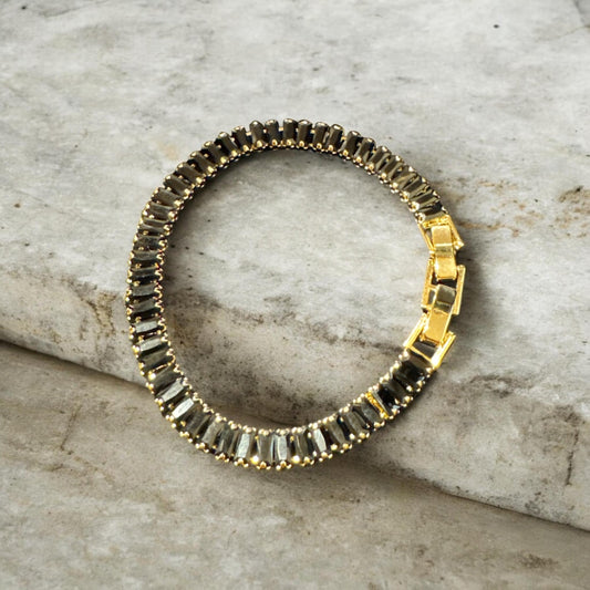 Pulsera de tenis bañado en oro